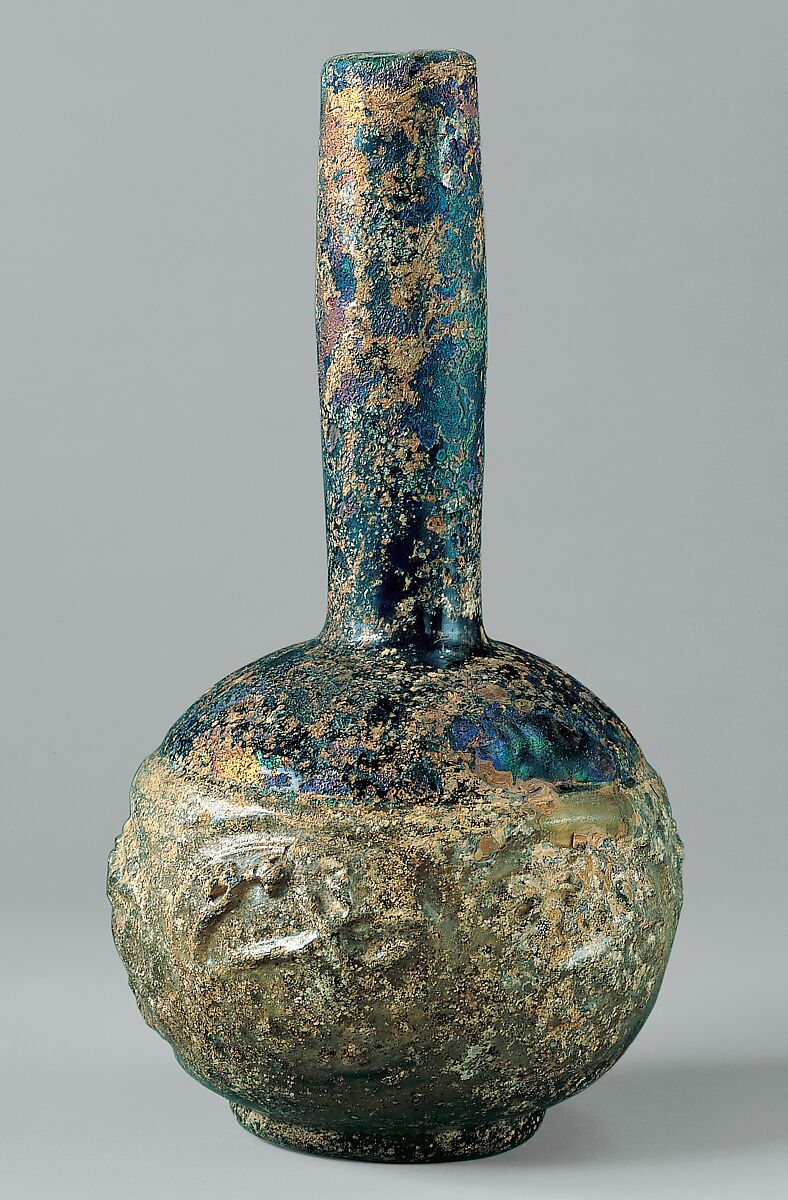 Bottle with Molded Designs of Animals, Glass; blown in two parts, impressed with tongs 