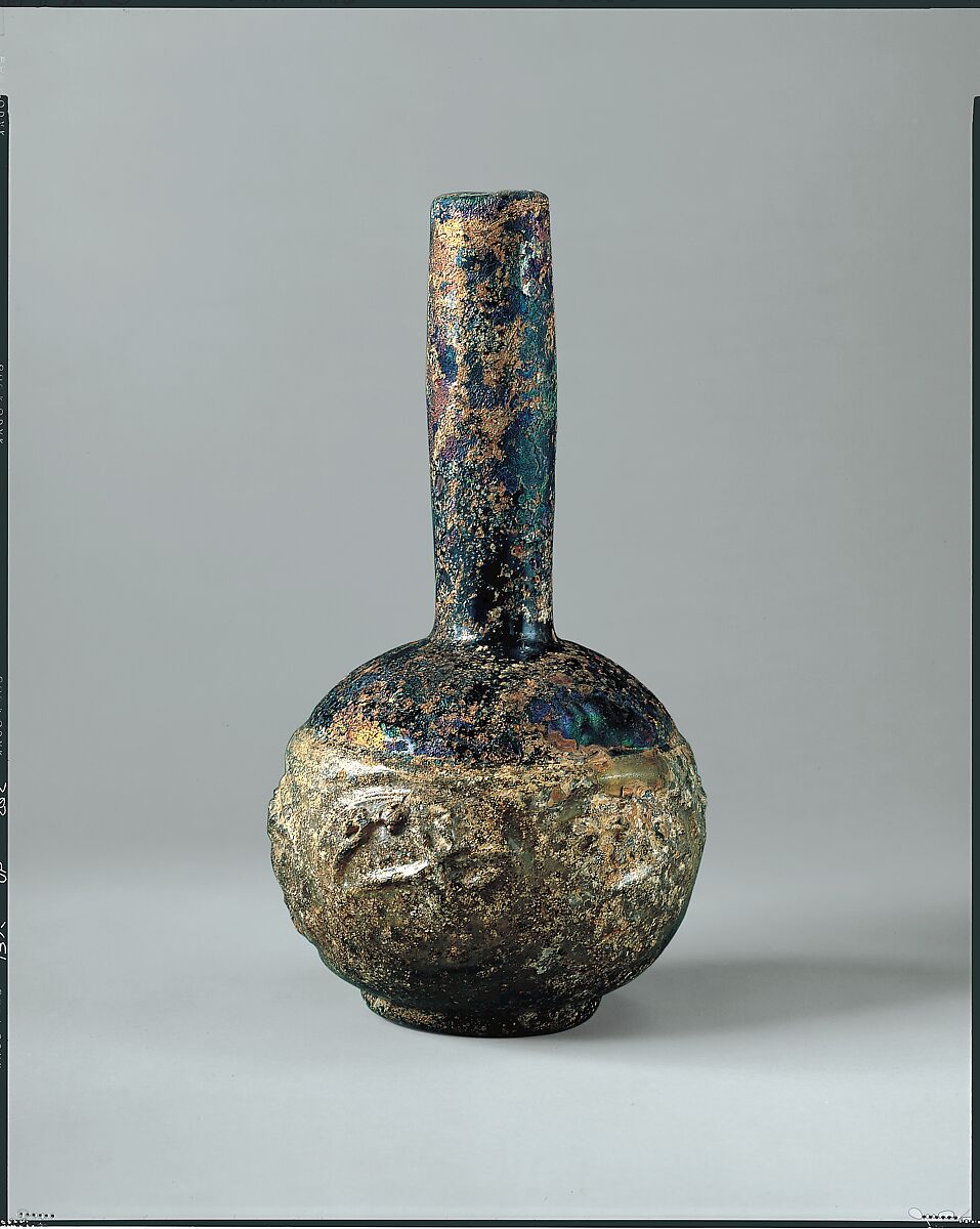 Bottle with Molded Designs of Animals, Glass; blown in two parts, impressed with tongs