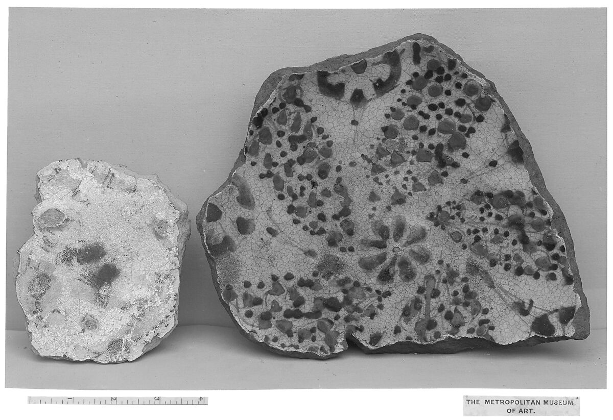 Fragment of a Bowl, reddish earthenware; white slip; green underglaze; transparent colorless glaze