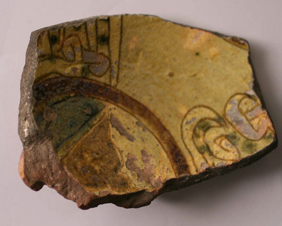 Fragment of a Bowl, Earthenware; incised decoration through a white slip and coloring under a transparent glaze. 