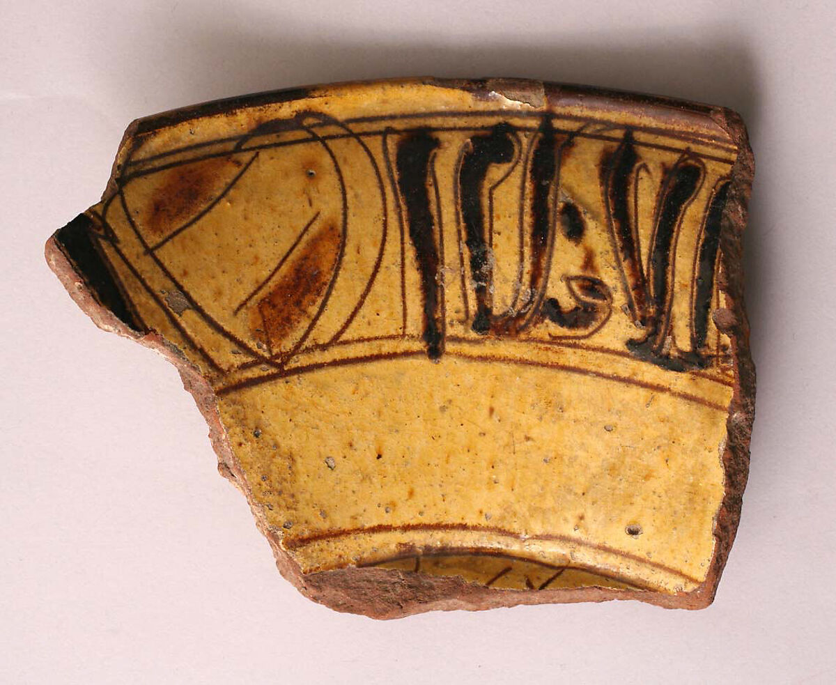 Fragment, Earthenware; incised decoration through a white slip and coloring under a transparent glaze. 