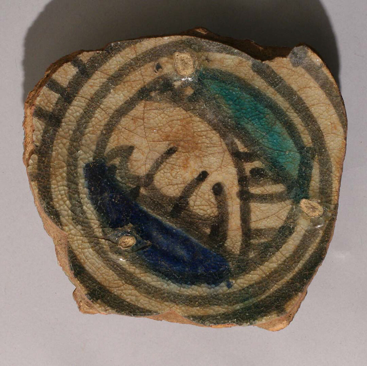 Fragment of a Bowl, Earthenware; white slip; underglaze blue and turquoise; transparent, colorless glaze 