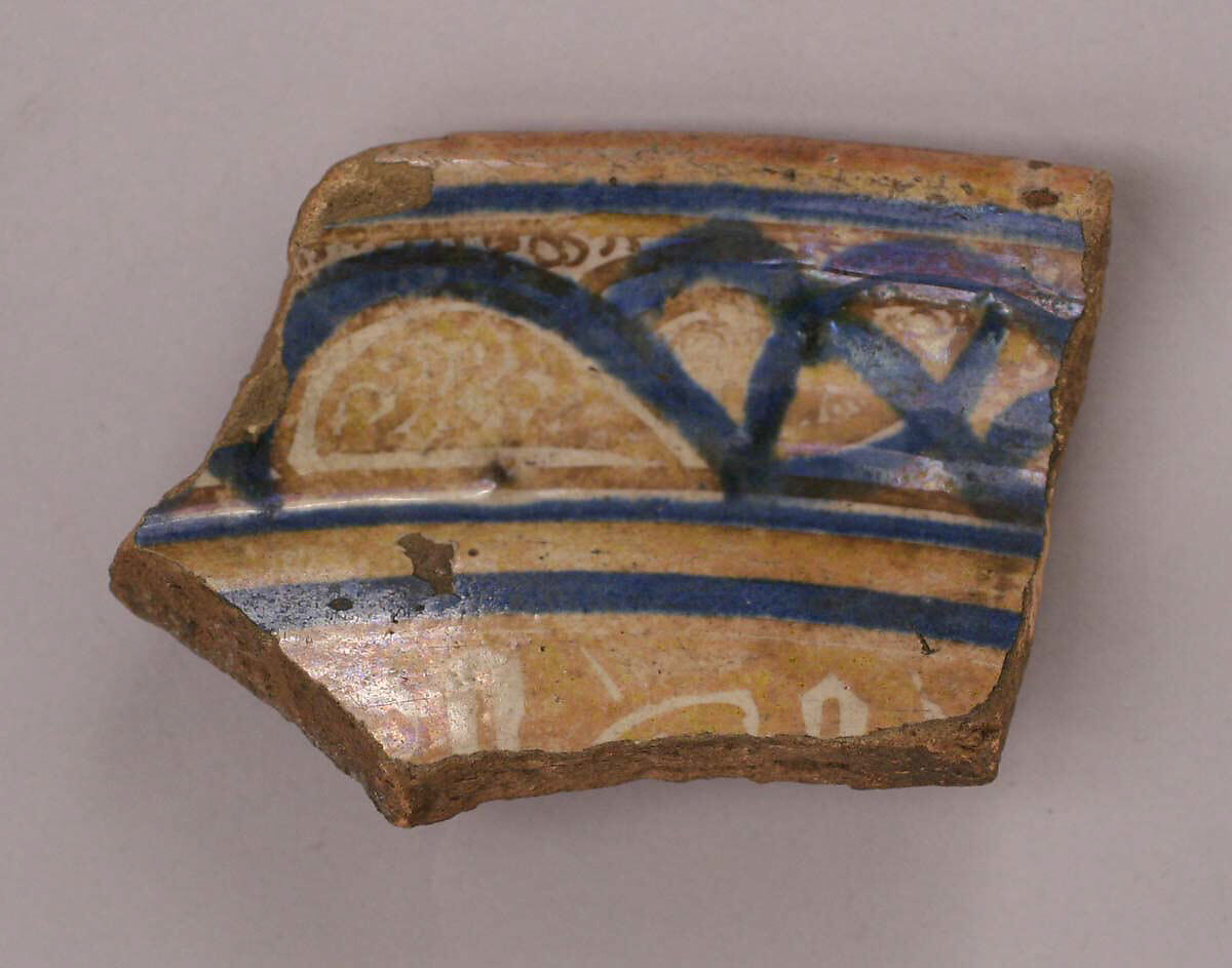 Fragment, Earthenware; white slip; underglaze blue; transparent colorless glaze; luster-painted 