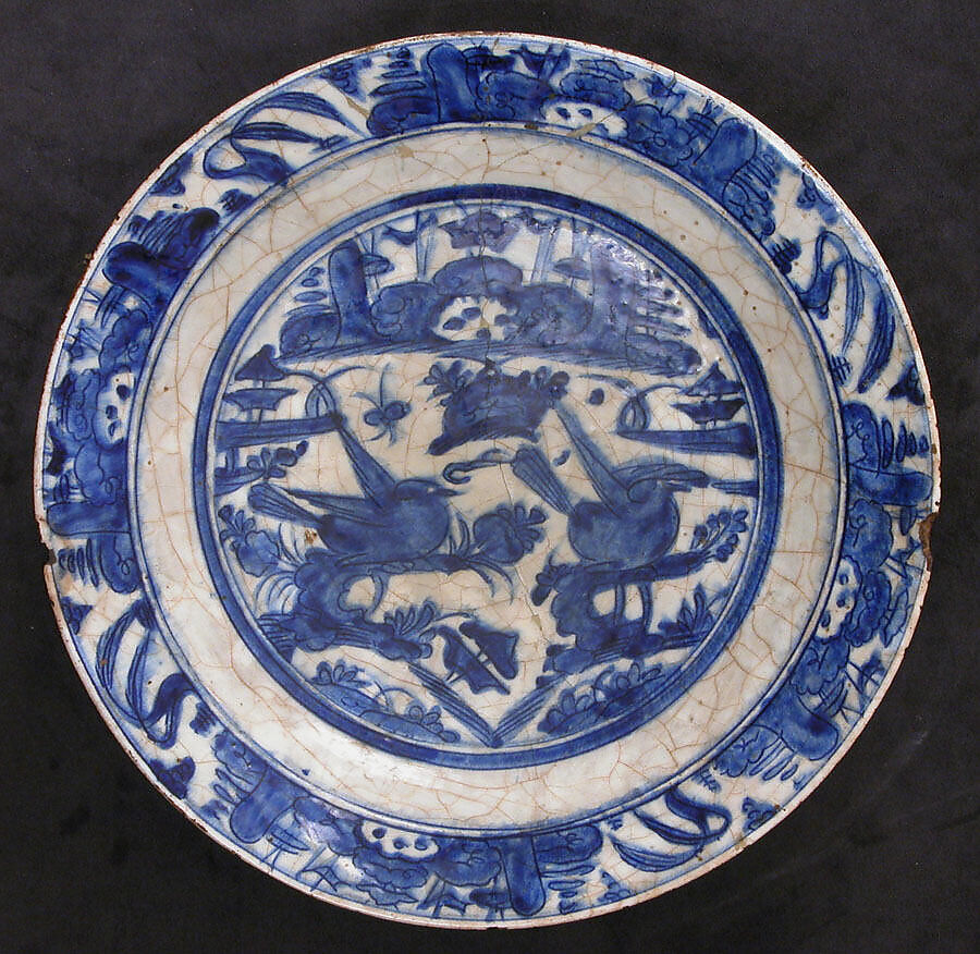 Dish, Stonepaste; underglaze blue; transparent, colorless glaze; unglazed base 