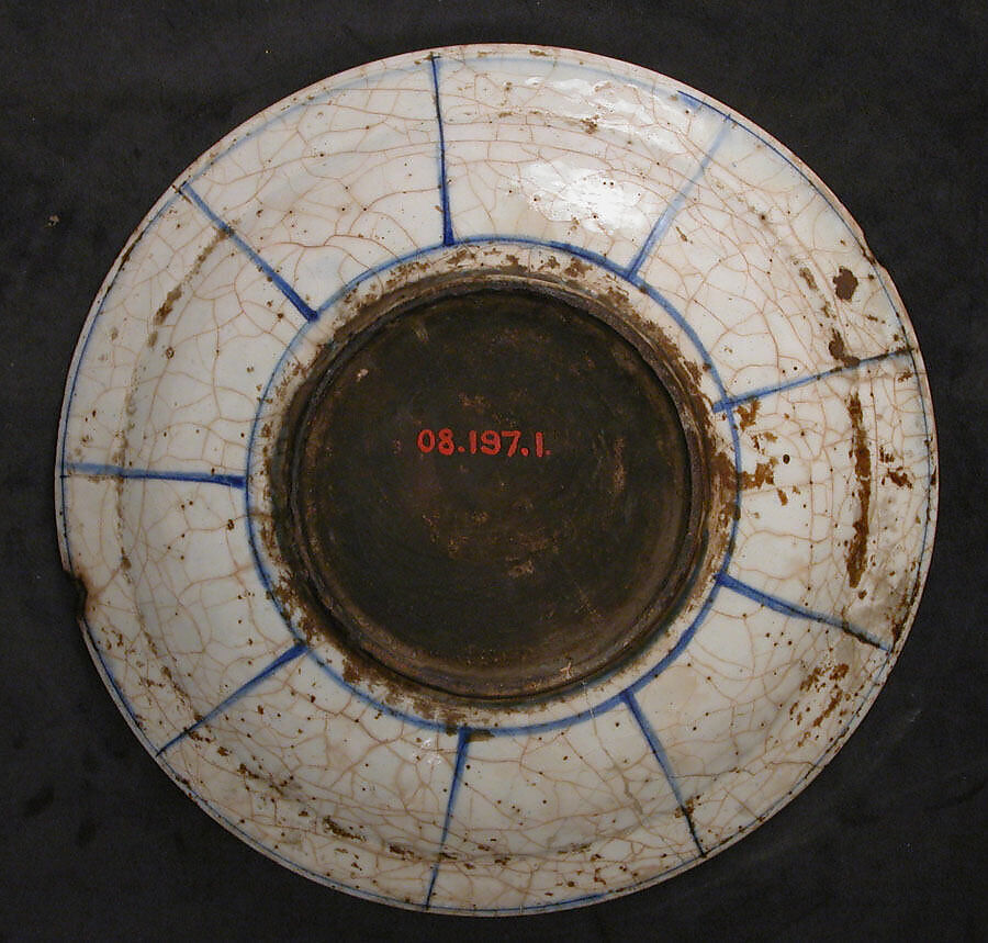 Dish, Stonepaste; underglaze blue; transparent, colorless glaze; unglazed base