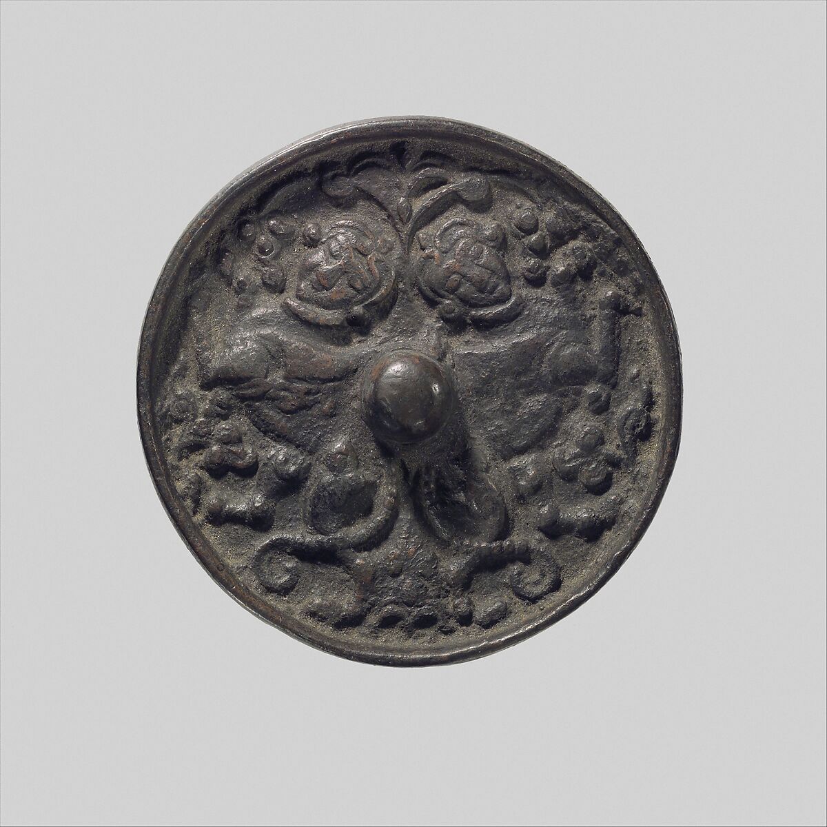 Mirror with a Pair of Addorsed Sphinxes with Scorpion Tails, Bronze; cast