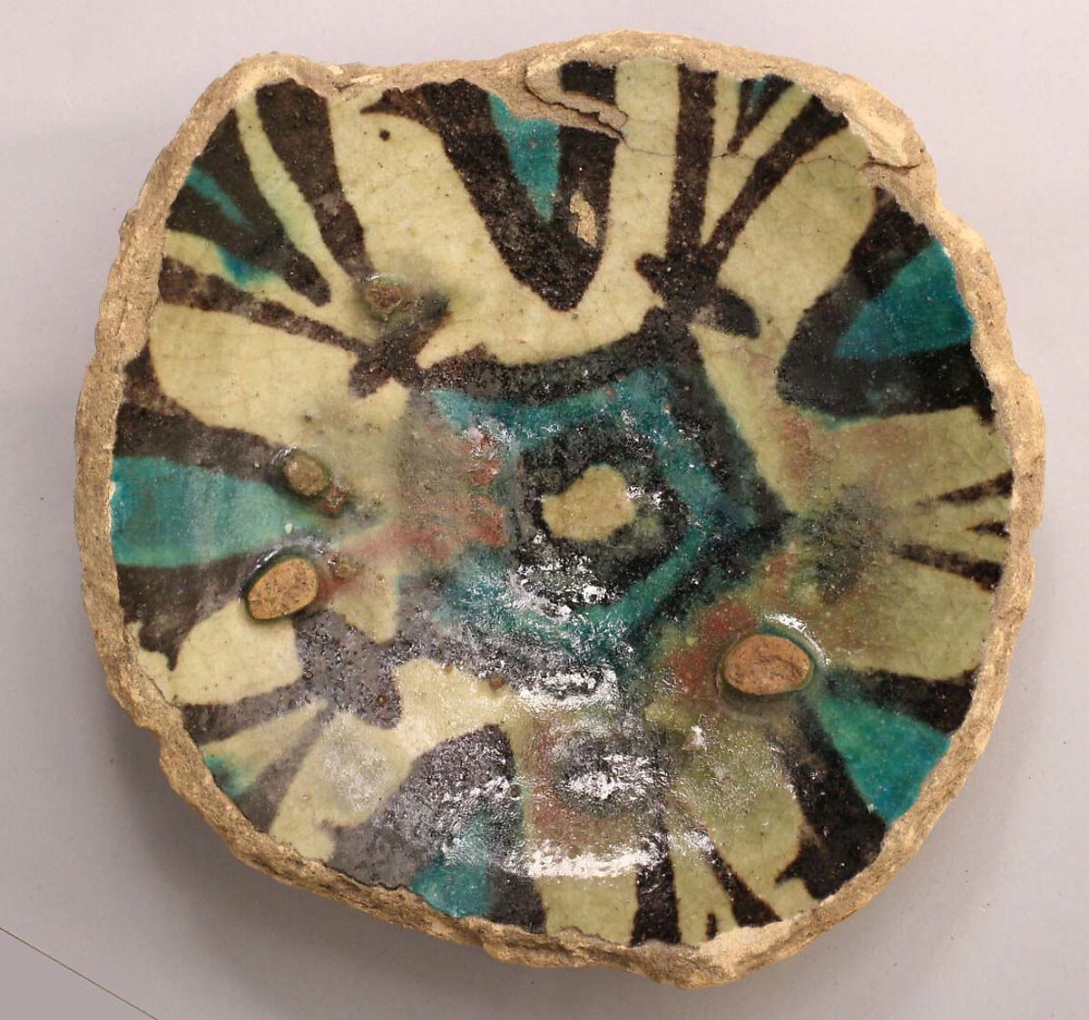 Fragment of a Bowl, Stonepaste; underglaze turquoise and black; transparent, colorless glaze 