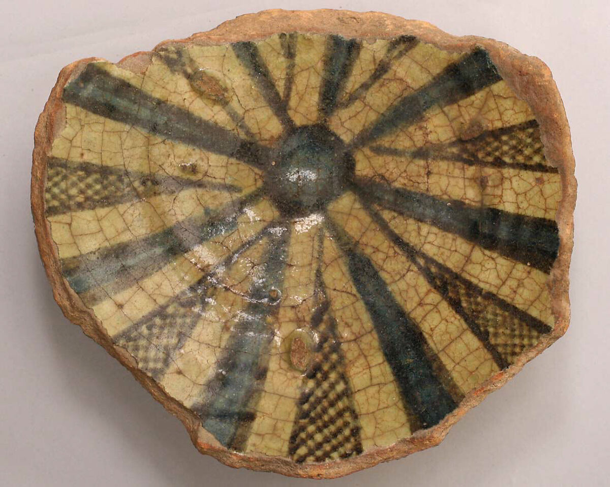 Fragment of a Bowl, Earthenware; incised decoration through white slip under a transparent glaze 