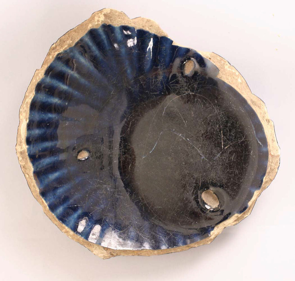 Fragment of a Bowl, Stonepaste; transparent blue glaze 