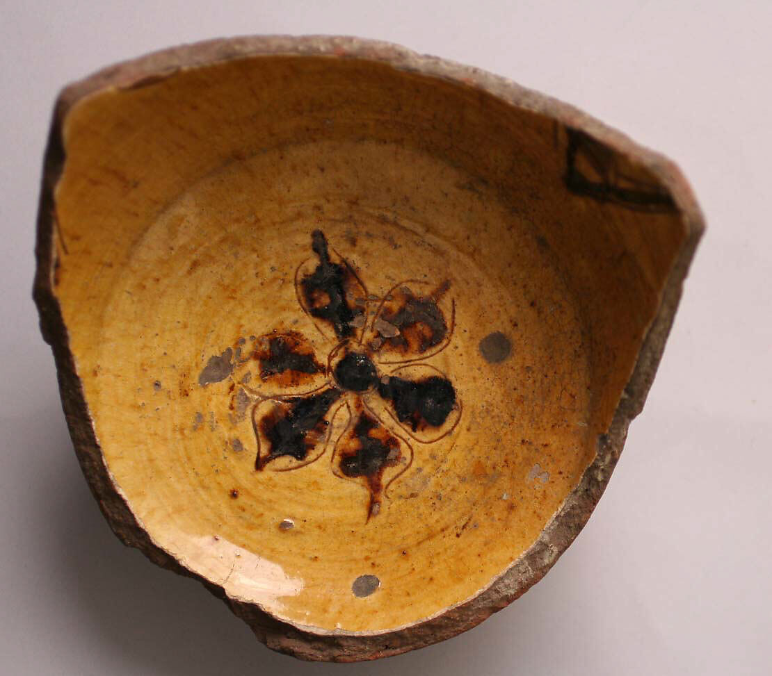 Fragment of a Bowl, Earthenware; incised decoration through white slip and coloring under transparent glaze 