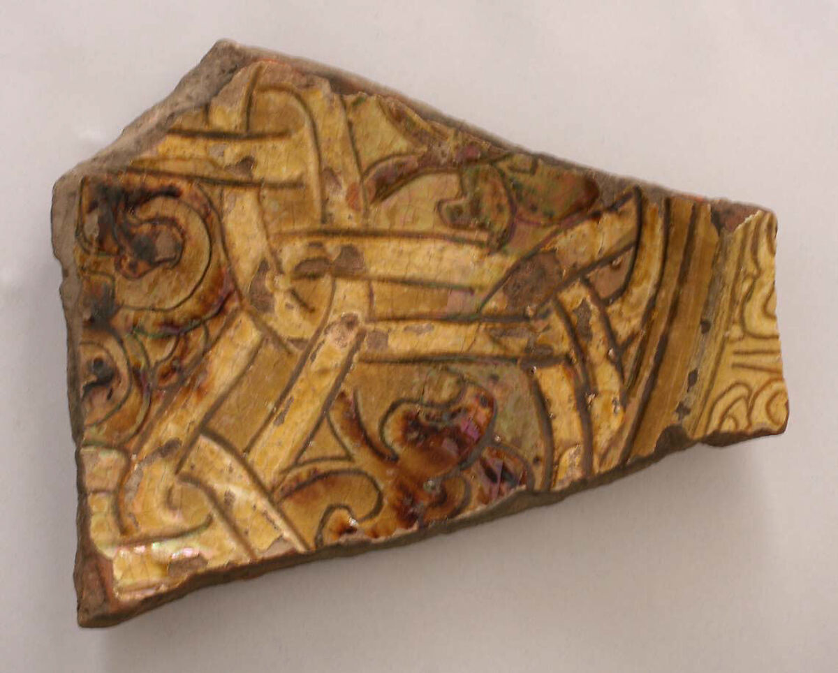 Fragment, Earthenware; incised decoration through white slip and coloring under transparent glaze 