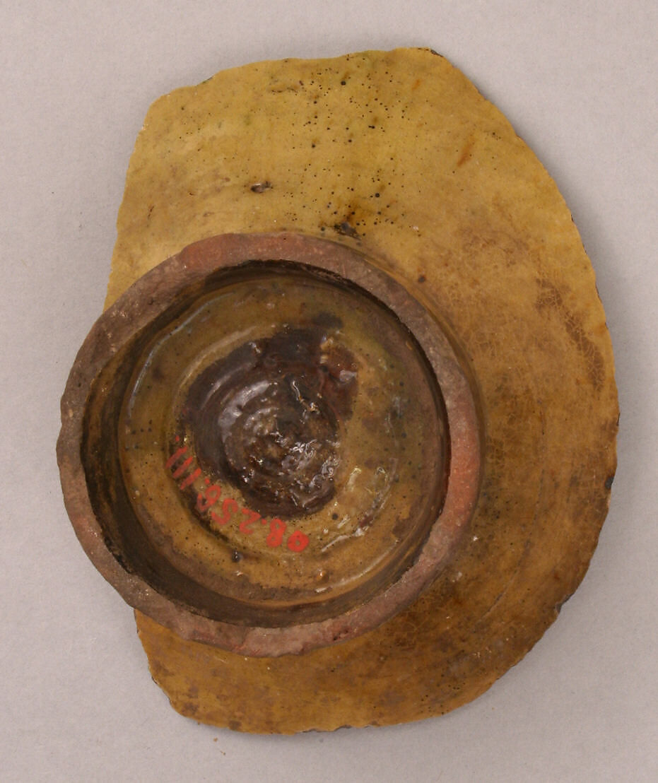 Fragment of a Bowl, Earthenware; incised decoration through white slip and coloring under transparent glaze