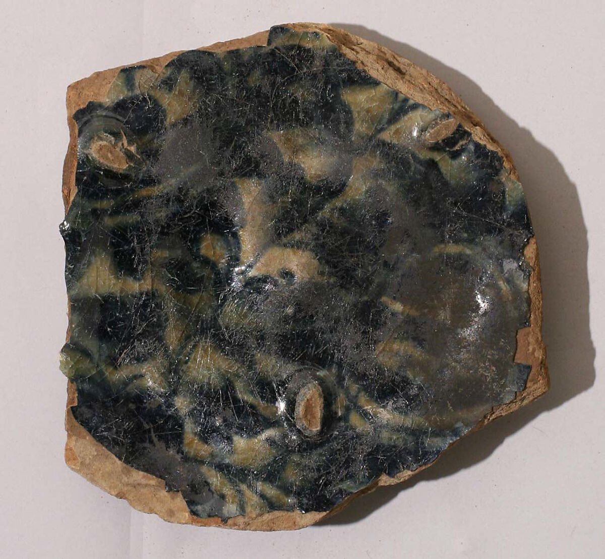 Fragment of a Bowl, Stonepaste; underglaze painted under colorless glaze 
