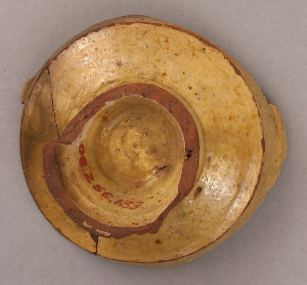 Fragment of a Bowl, Earthenware; incised decoration through white slip and coloring under transparent glaze