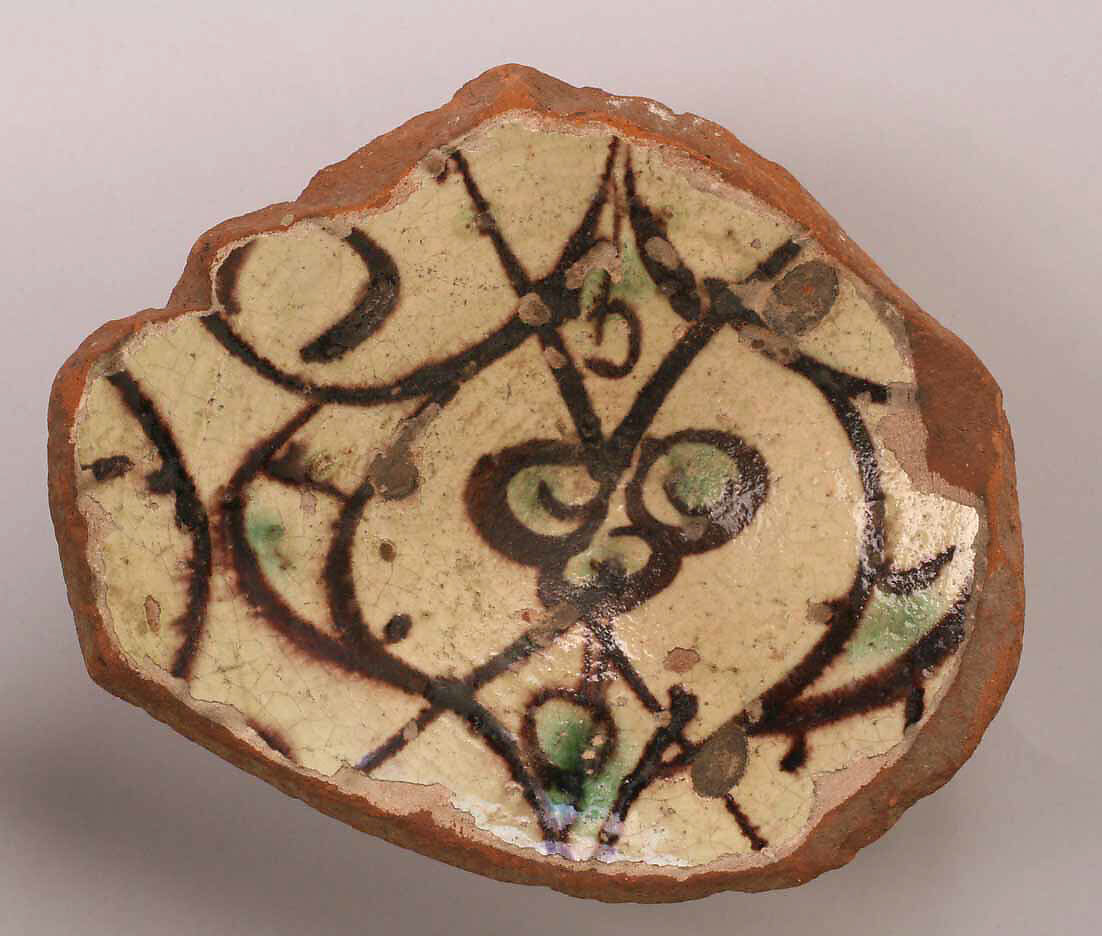 Fragment of a Bowl, Earthenware; glazed over slip 