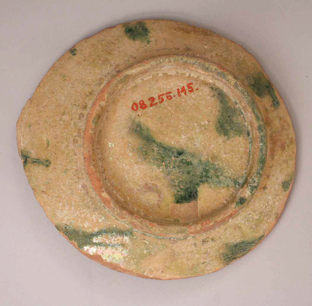 Fragment of a Bowl, Earthenware; incised decoration through white slip and coloring under transparent glaze