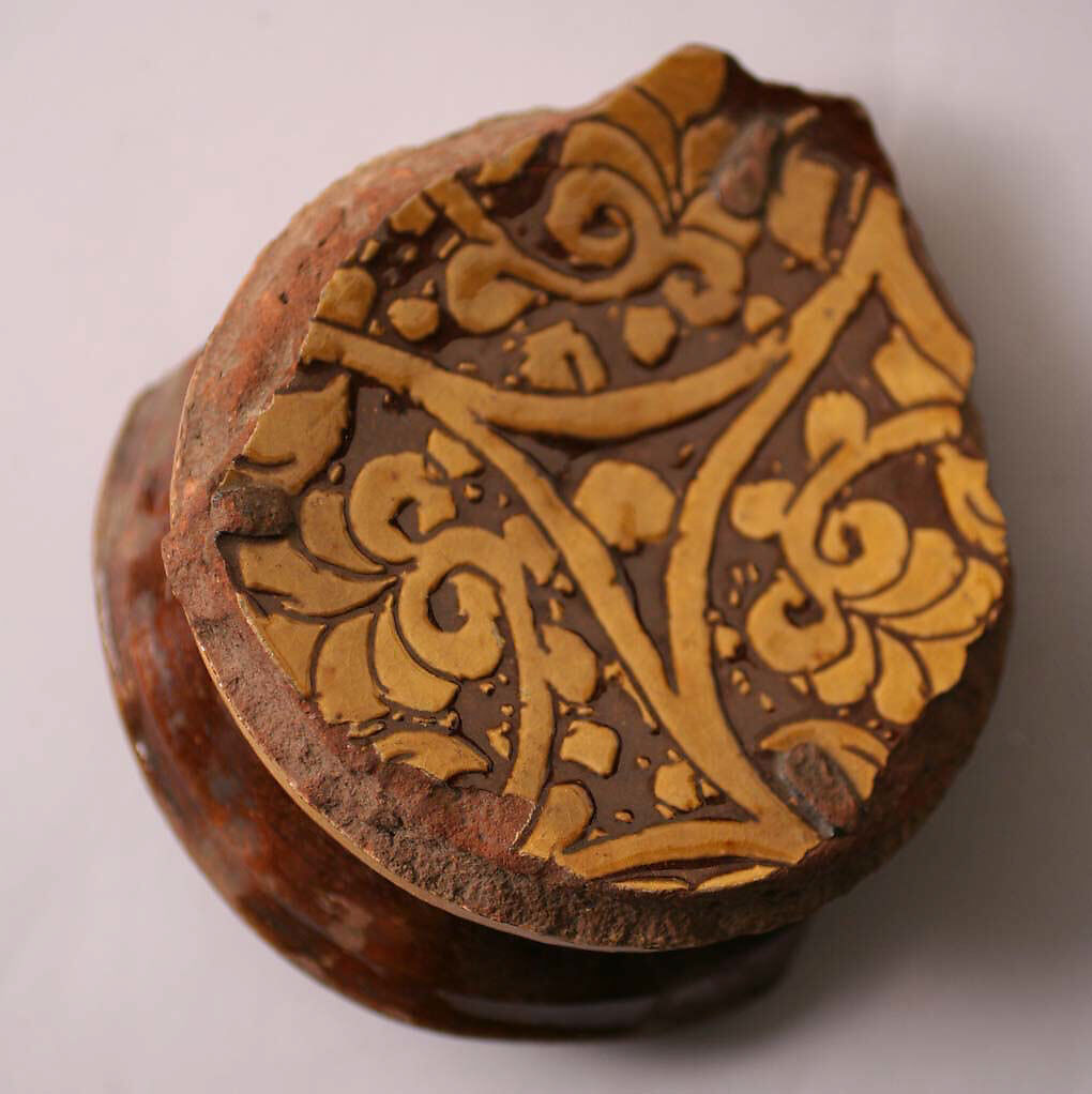 Fragment of a Bowl, Earthenware; incised decoration through white slip and coloring under transparent glaze 