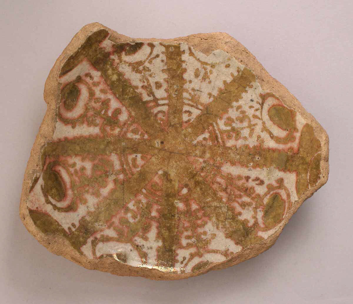 Fragment of a Bowl, Earthenware; tin enameled, luster-painted 