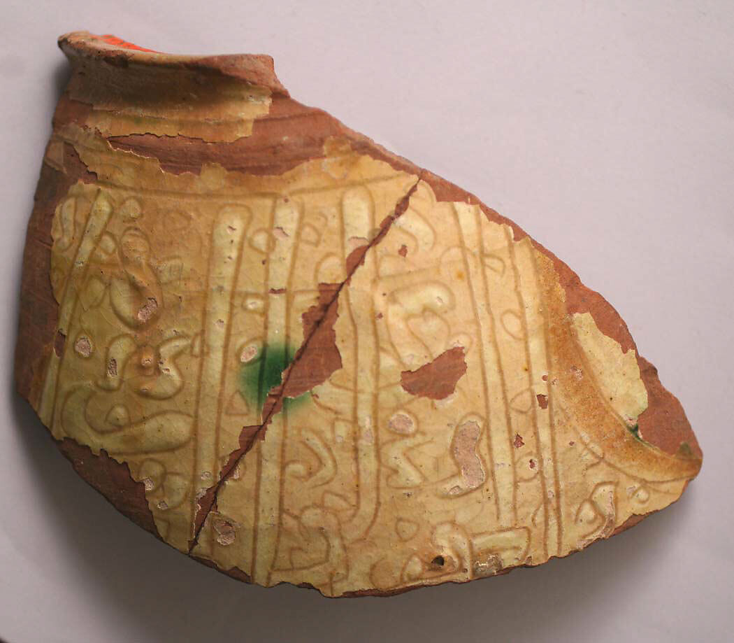 Fragment, Earthenware; incised decoration through white slip and coloring under transparent glaze 