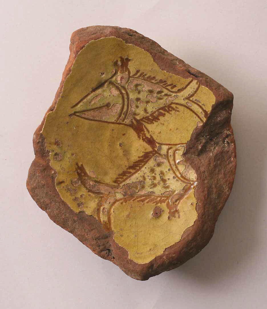 Fragment of a Bowl, Earthenware; incised decoration through white slip and coloring under transparent glaze 