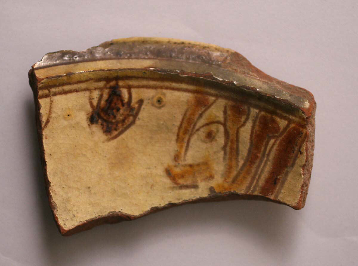 Fragment, Earthenware; incised decoration through white slip and coloring under transparent glaze 