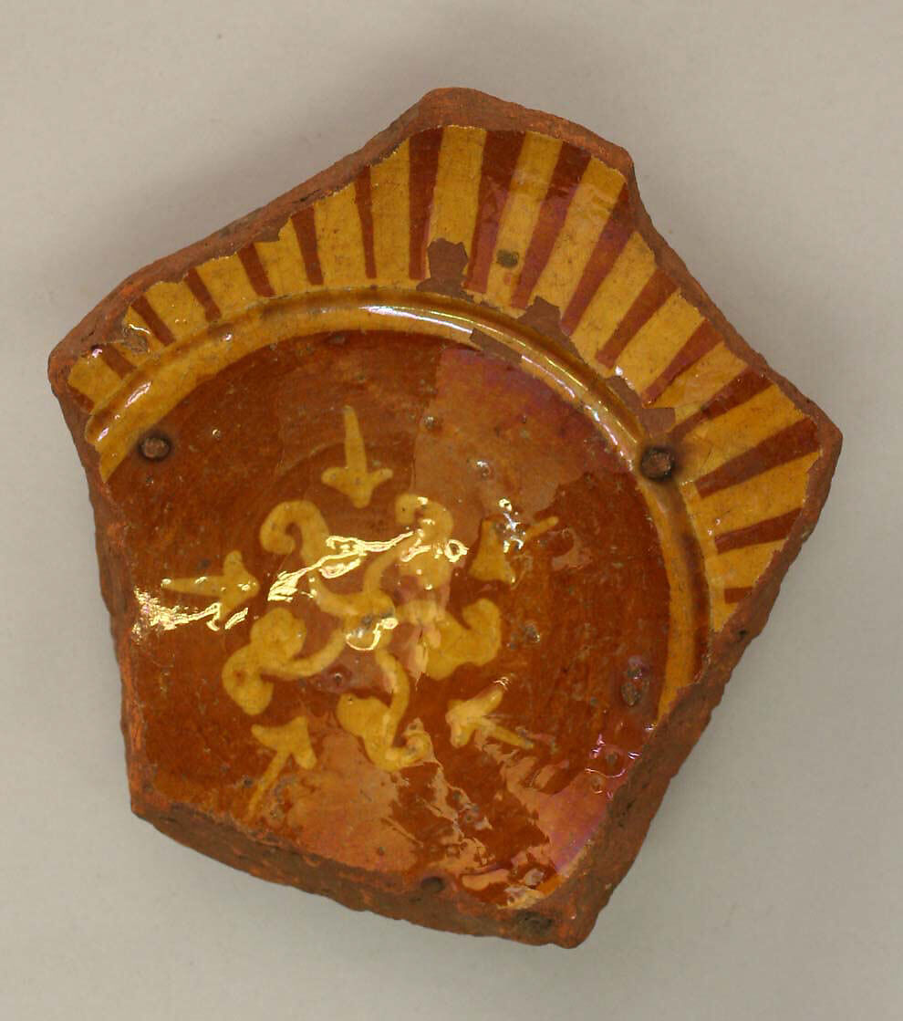 Fragment of a Bowl, Earthenware; slip-painted under transparent glaze 