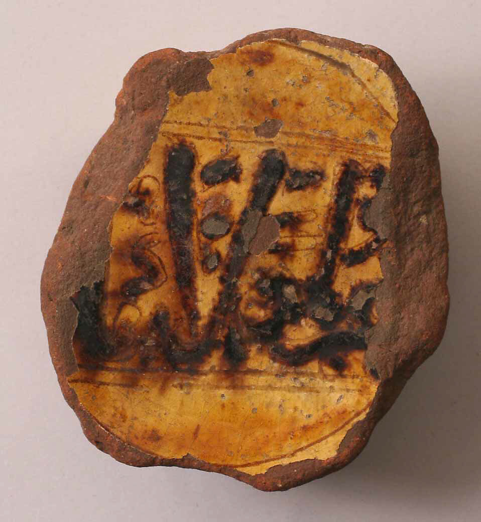 Fragment of a Bowl, Earthenware; incised decoration through white slip and coloring under transparent glaze 