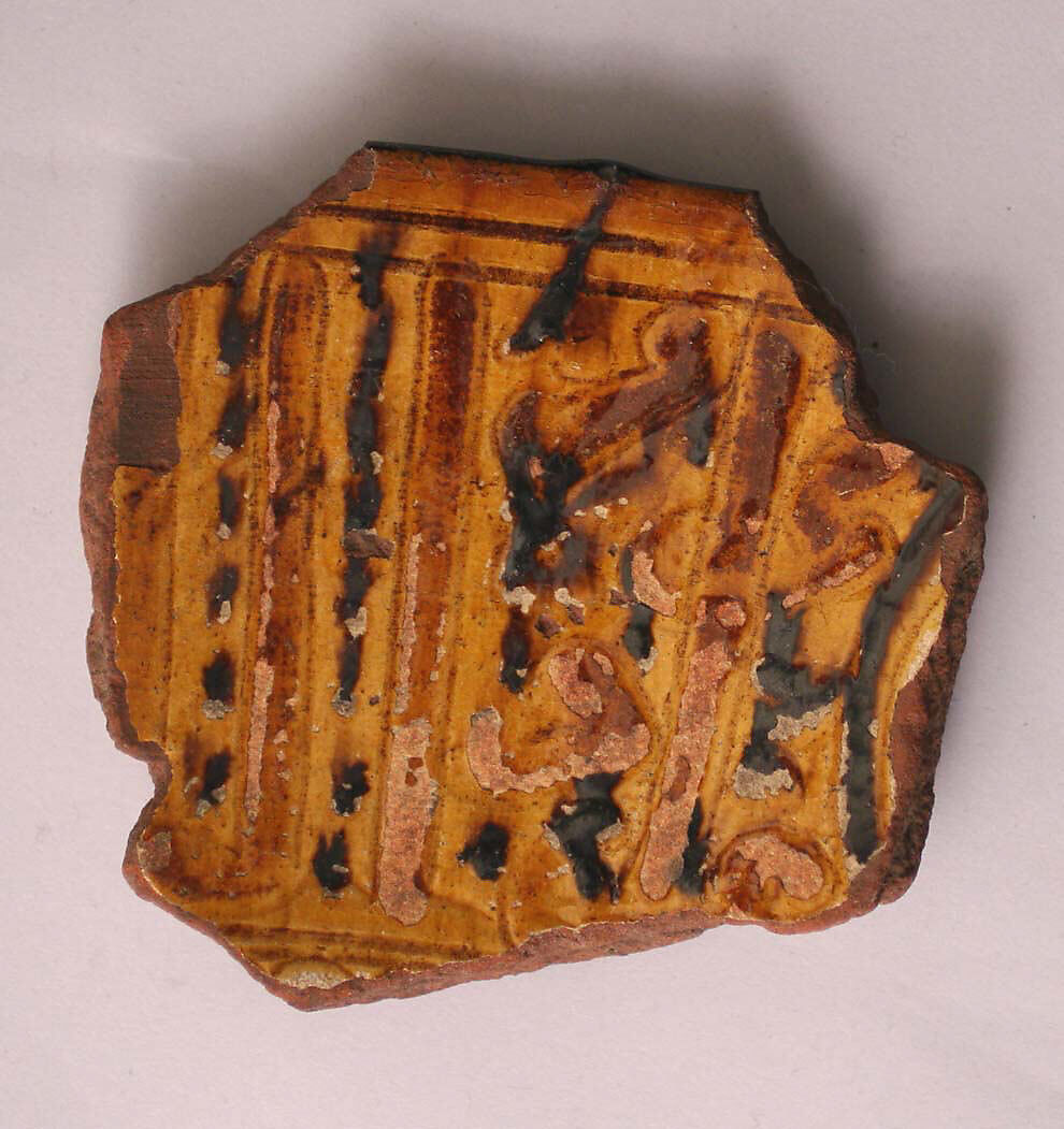 Fragment, Earthenware; incised decoration through white slip and coloring under transparent glaze 