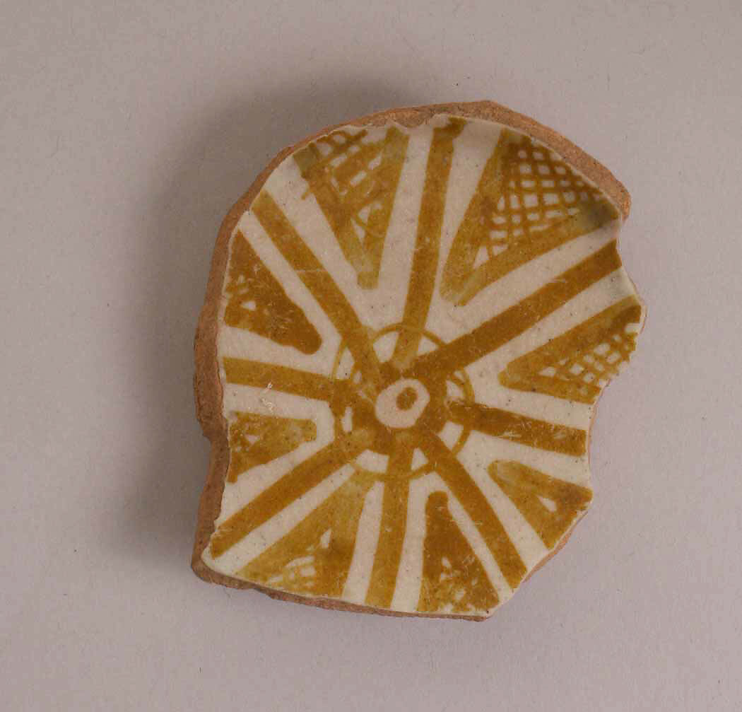 Fragment of a Bowl, Earthenware; luster-painted on opaque white glaze under transparent colorless glaze 