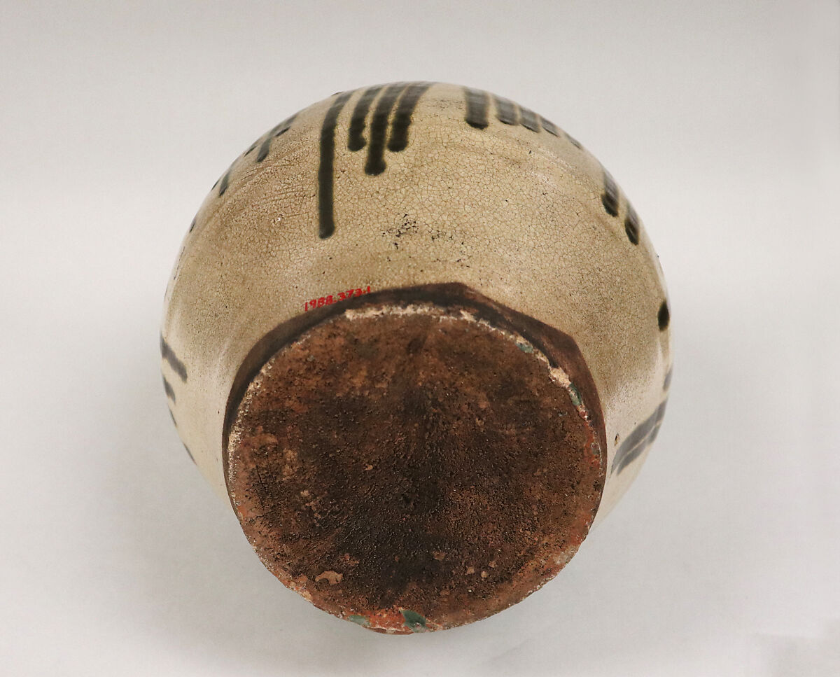 Sake jar, Stoneware with opaque white glaze; over this, a dense iron glaze dripped in a vertical pattern  (Shigaraki ware), Japan