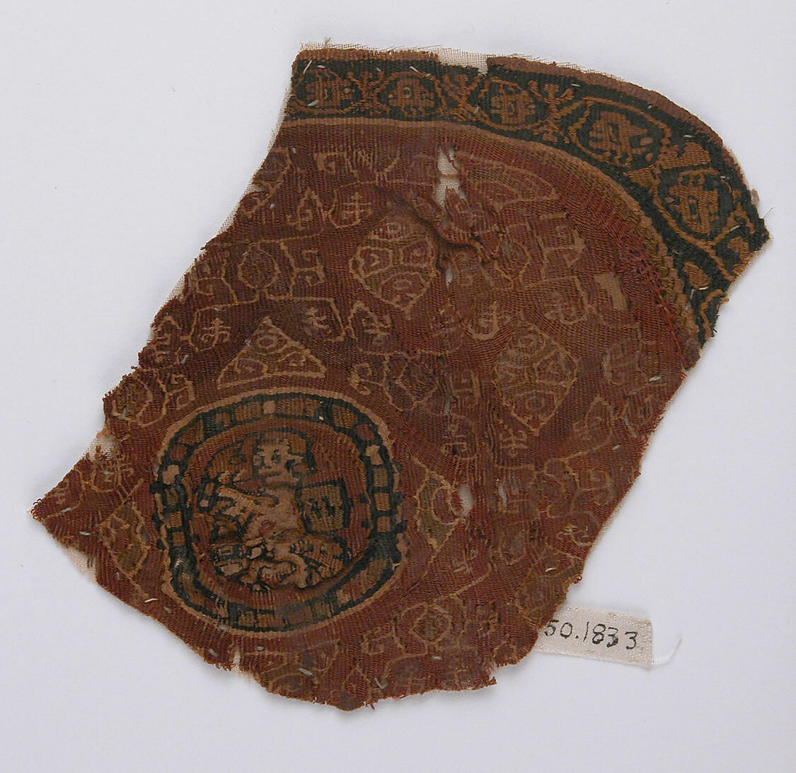 Fragment of Roundel, Linen, wool; tapestry weave