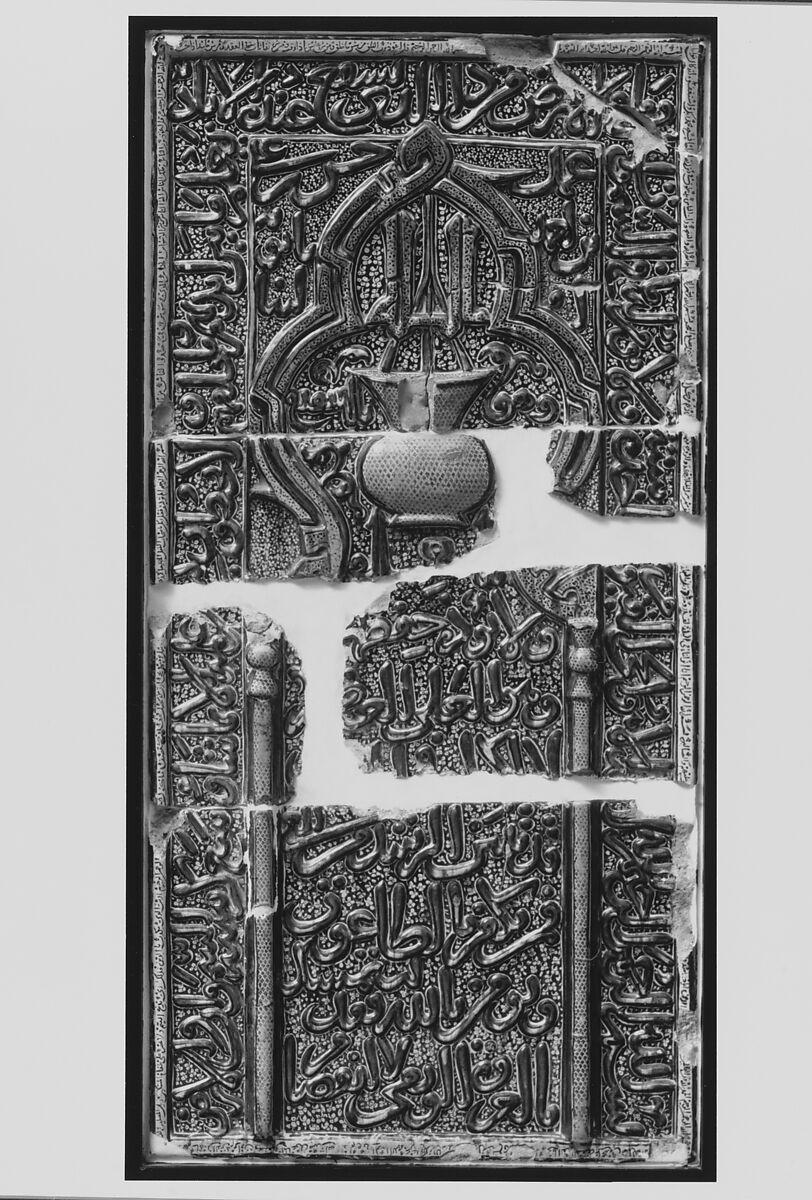 Tile Panel in the form of an Architectural Niche, Hasan ibn `Ali ibn Ahmad  Babavaih, Stonepaste; inglaze painted in blue, luster-painted on opaque white glaze, modeled