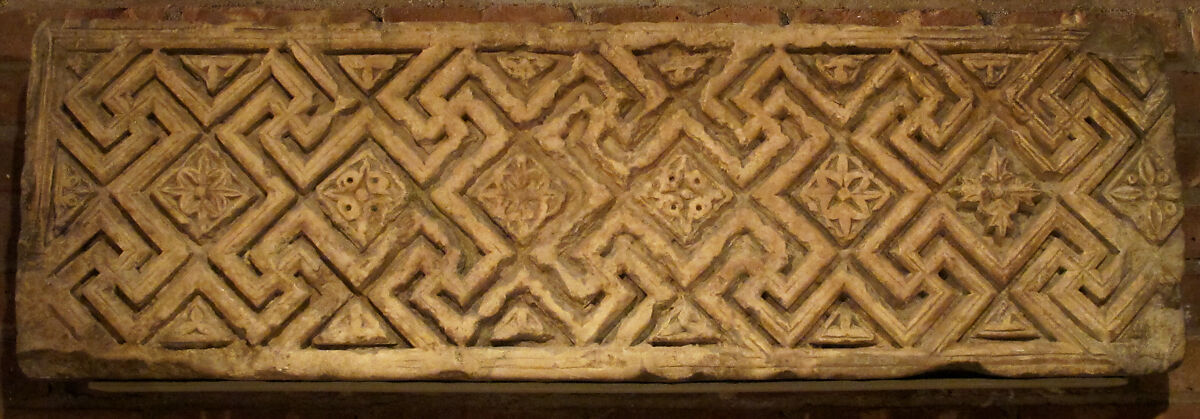 Fragment from a Frieze with Meander Pattern and Diamond-Shaped Rosettes, Limestone; carved in relief