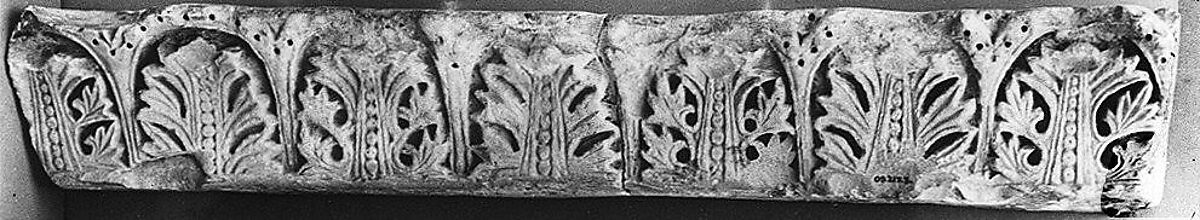Fragment from a Molding with Acanthus Clusters under Arcades, Limestone; carved in relief