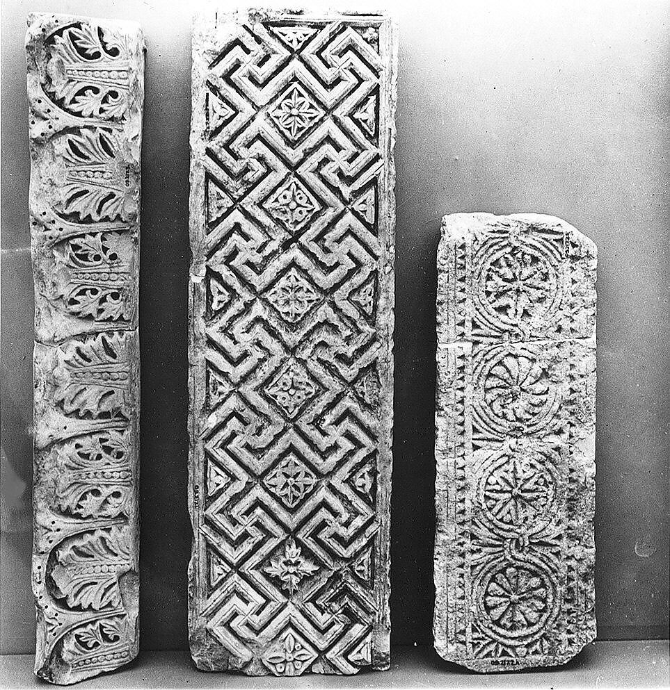 Fragment from a Molding with Acanthus Clusters under Arcades, Limestone; carved in relief