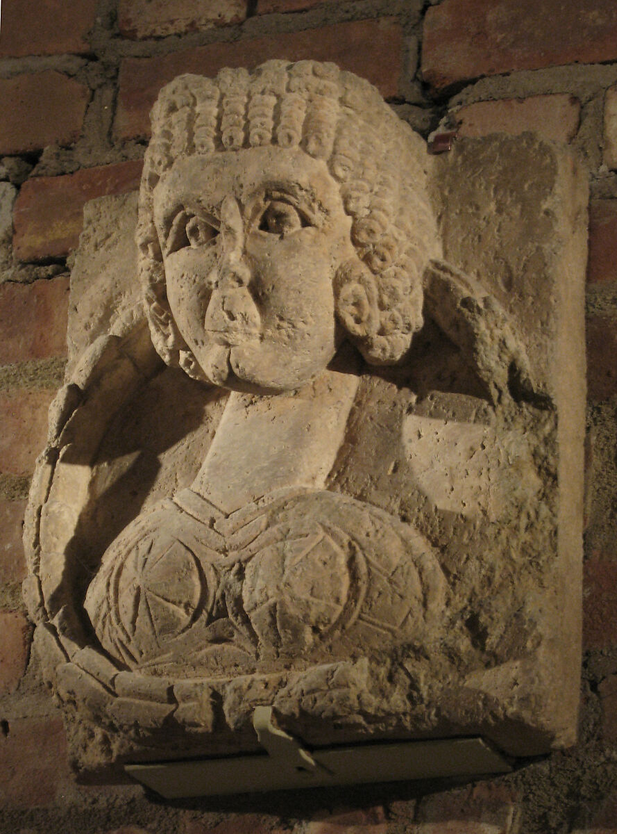 Fragment from a Relief with the Bust of a Woman, Limestone; carved