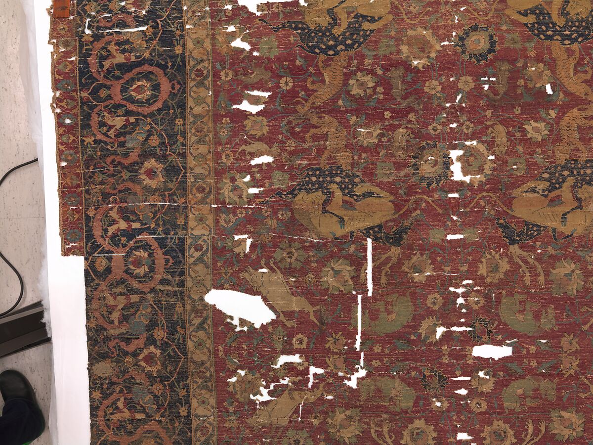 Carpet, Silk (warp and weft), wool (pile); asymmetrically knotted pile