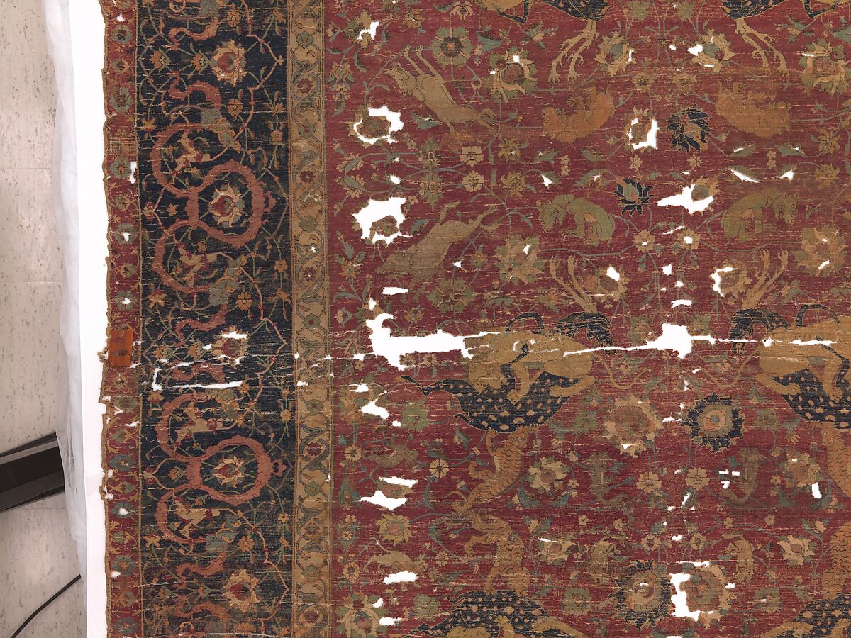 Carpet, Silk (warp and weft), wool (pile); asymmetrically knotted pile