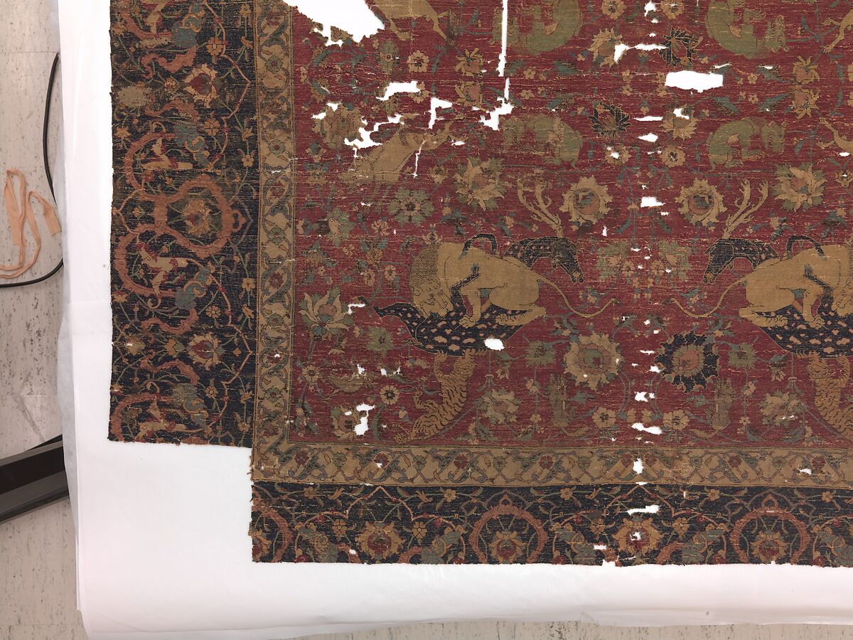 Carpet, Silk (warp and weft), wool (pile); asymmetrically knotted pile