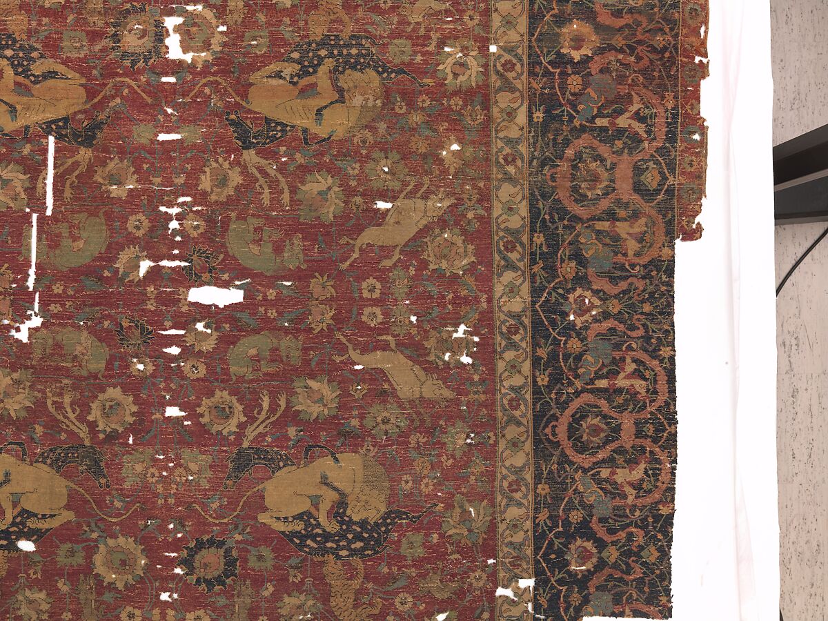 Carpet, Silk (warp and weft), wool (pile); asymmetrically knotted pile