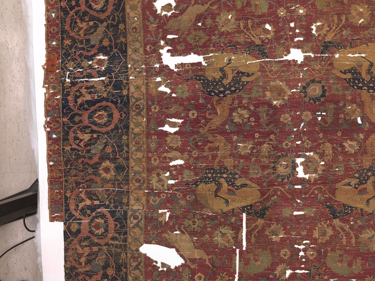 Carpet, Silk (warp and weft), wool (pile); asymmetrically knotted pile