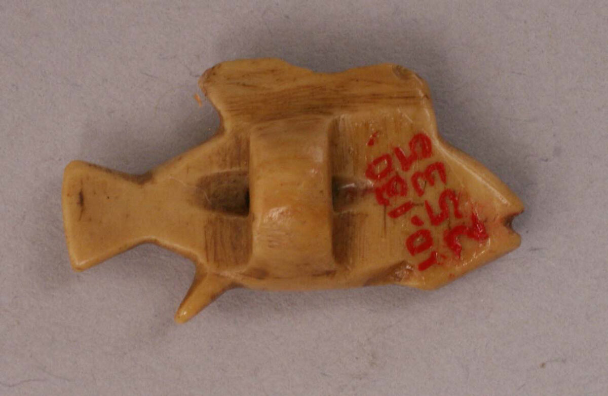 Amulet, Ivory or bone; incised and inlaid with paint