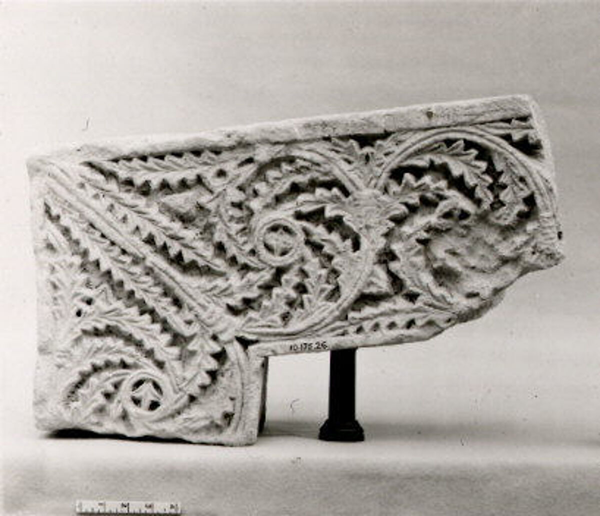 Corner of Door Frame with Scrolling Acanthus Leaves, Limestone; carved in relief
