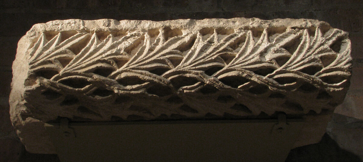 Fragment from a Molding with Intertwined Vines and Acanthus Leaves, Limestone; carved in relief 