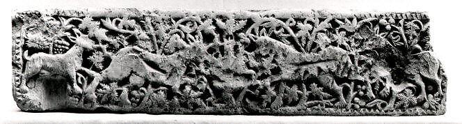 Panel with Animals Flanking a Vase Against a Pattern of Scrolls, Limestone; carved in relief