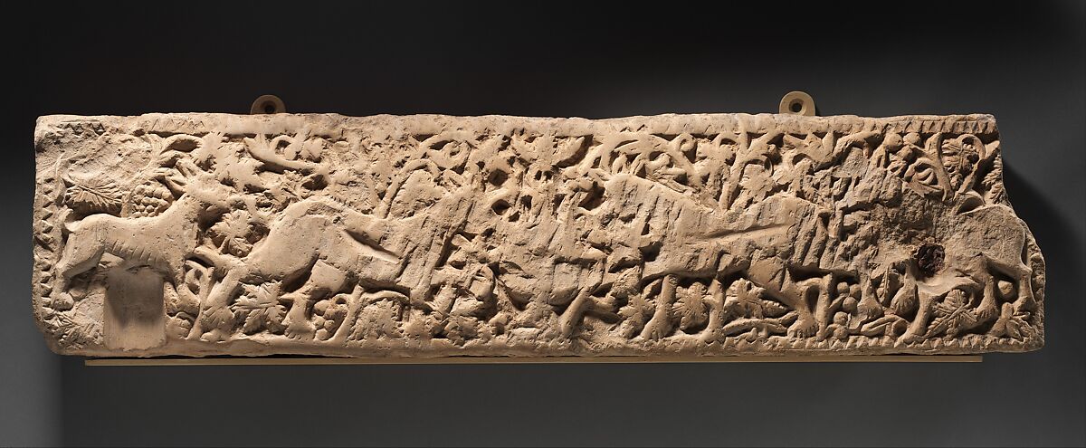 Panel with Animals Flanking a Vase Against a Pattern of Scrolls, Limestone; carved in relief 