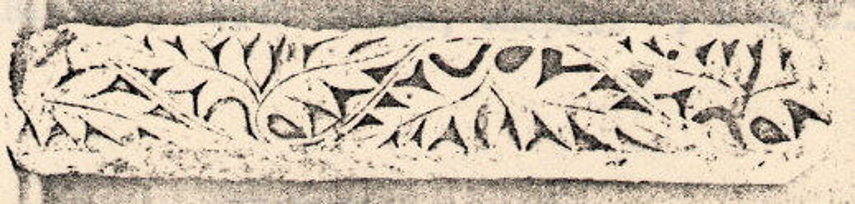 Fragment from a Post or Lintel with Leaves Branching from a Running Vine, Limestone; carved in relief