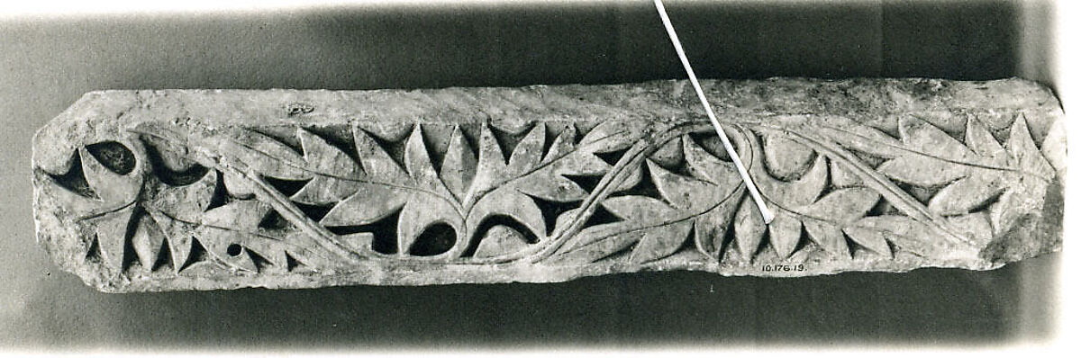 Fragment from a Post or Lintel with Leaves Branching from a Running Vine, Limestone; carved in relief 