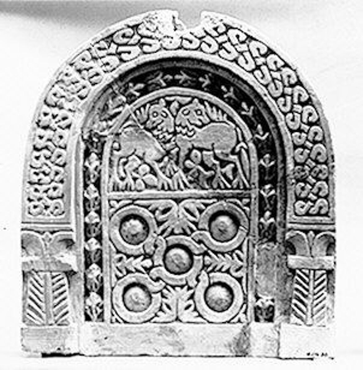 Funerary Stele with Two Lions and Circle Pattern within a Niche, Limestone; carved in relief 