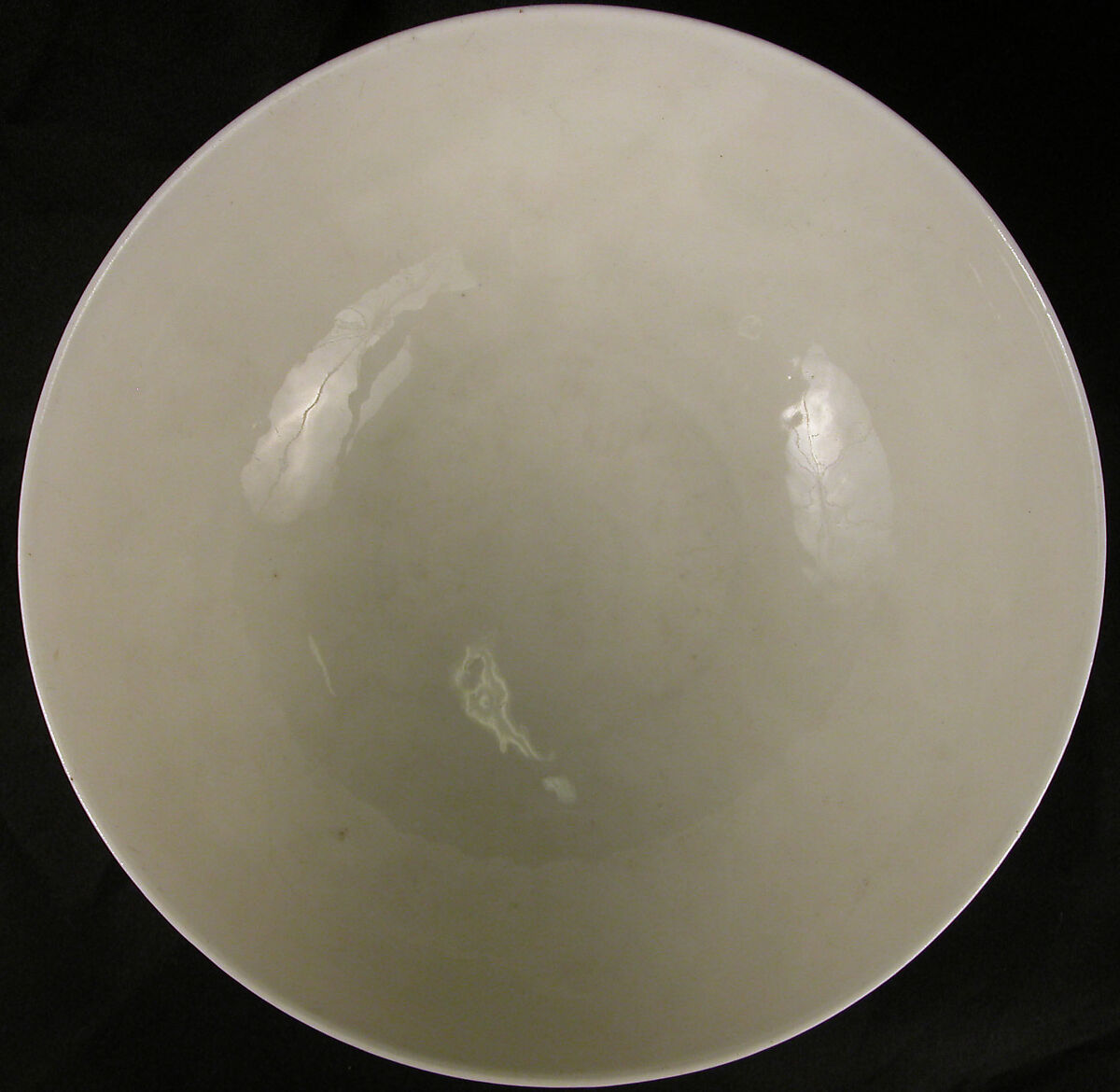 Bowl with Incised Lotus Flowers, Stonepaste; incised under transparent glaze (Gombroon ware)